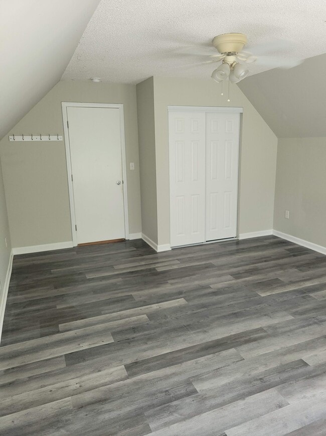 Photo - 221 Long St Unidad Upstairs Bedroom (L)