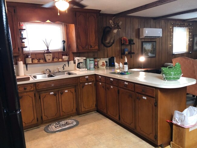 Eat in Kitchen, full size refrigerator and stove, table for 4 - 8562 Jc Rd Unit 8562 A