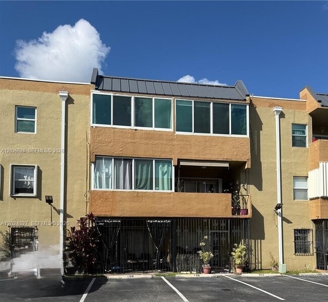 Building Photo - 6070 W 18th Ave Unit 209