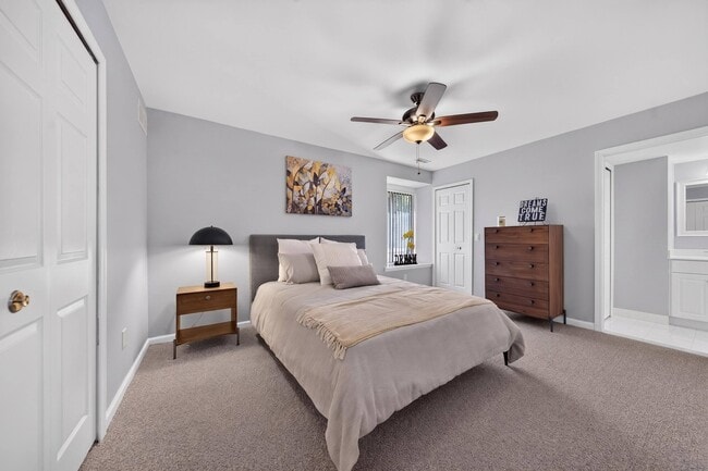 Spacious bedroom at Lakeside Village Apartments in Clinton Township, MI. - Lakeside Village Apartments