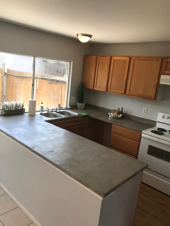 Kitchen with beautiful faux concrete counter tops