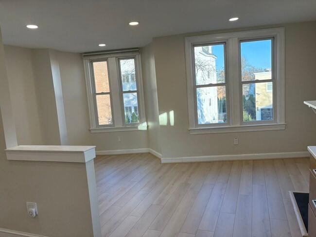 Plenty of windows and dedicated living and dining spaces - 1514 31st St NW Unit 1514