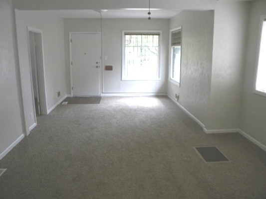 Photo - Adorable home with nice amenities!  yard, carport, Walk to shops & Bus!
