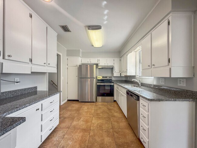 Photo - Spacious 4 Bed 2.5 Bath Home with 2-Car Garage & Fenced Yard in Jacksonville, FL