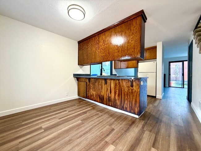 Photo - **$1000 DEPOSIT + TWO WEEKS FREE RENT** Spacious Townhouse in the Heart of Garden Home~ New LVP F...