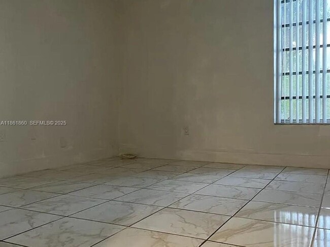 Building Photo - 8850 Fontainebleau Blvd Unit 303