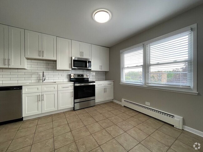 Building Photo - Charming 1-Bed, 1-Bath Apartment in the He... Unit 29 R