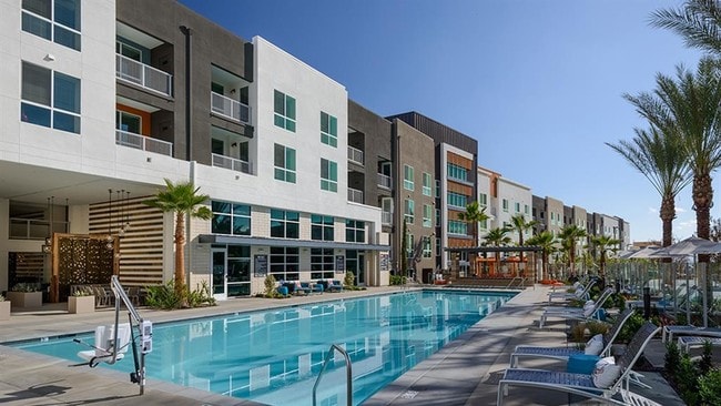 Resort-style pools and spas with outdoor entertainment areas