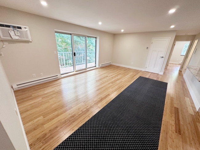 Photo - Stylish Corner Unit in Prime Needham Locat...