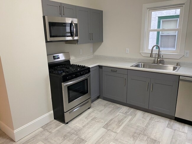 Building Photo - 3052 California St NE Unit 1