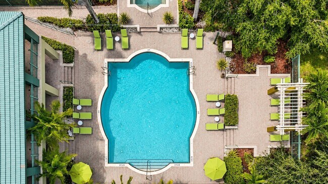 Relax in style at Club Mira Lago, where the stunning resort-style pool invites you to unwind. Surrounded by lush greenery and chic lounge seating, this oasis is perfect for sunny days and social gatherings. Reserve your spot in paradise today!