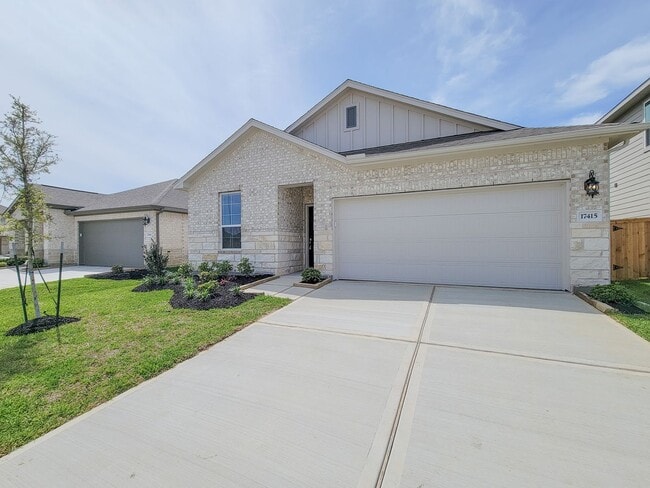 Photo - Single-story layout features a bright, open concept living area, dining space, and kitchen. Pebbl...