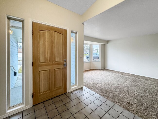 Photo - Spacious 3-Bedroom Home with 3-Car Garage, Fenced Yard & Easy Commute to Downtown Boise & BSU