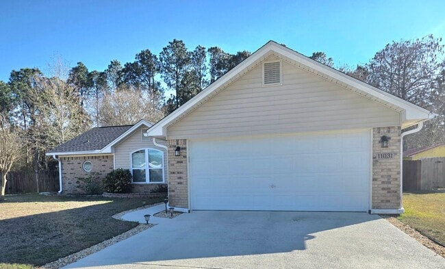 Photo - Inviting Woodridge Manor 3/2 Home with Fireplace and Fenced Yard