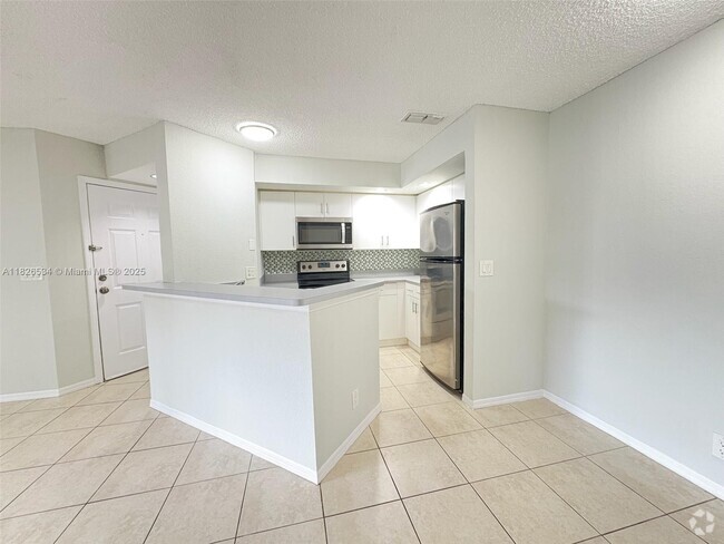 Building Photo - 3480 Pinewalk Dr N Unit 124 Rental