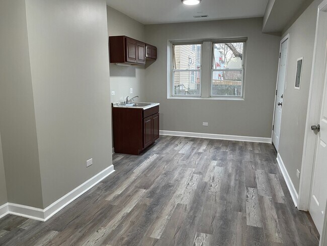 Photo - 709 W 74th St Apartments