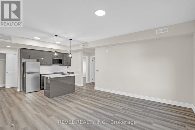 Photo - 261 King St E Unité 2D