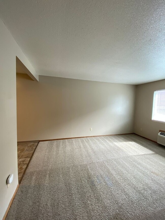 Photo - Keyless Entry • On-Site Laundry • Free WiFi Unit 22