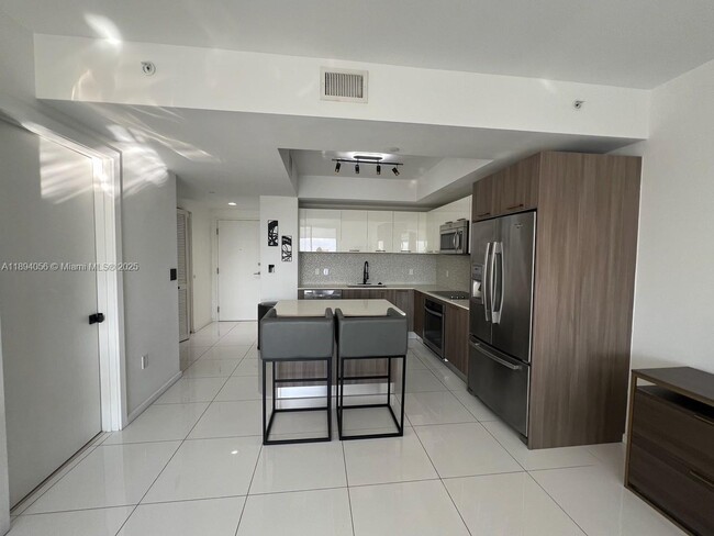 Building Photo - 5300 Paseo Blvd Unit 810