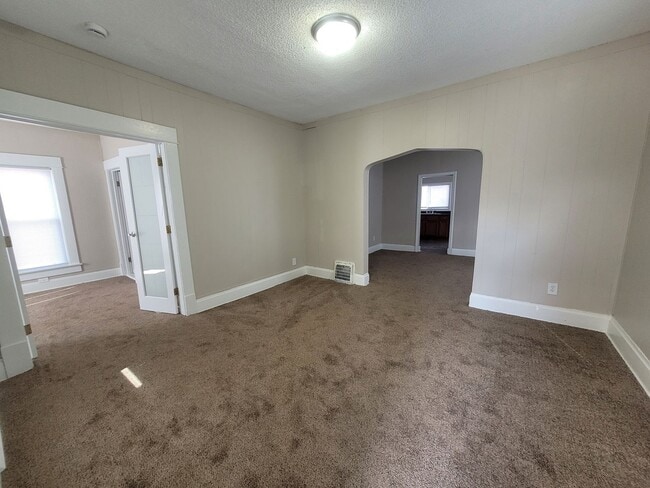 Building Photo - Two bedroom home with partially fenced yard!