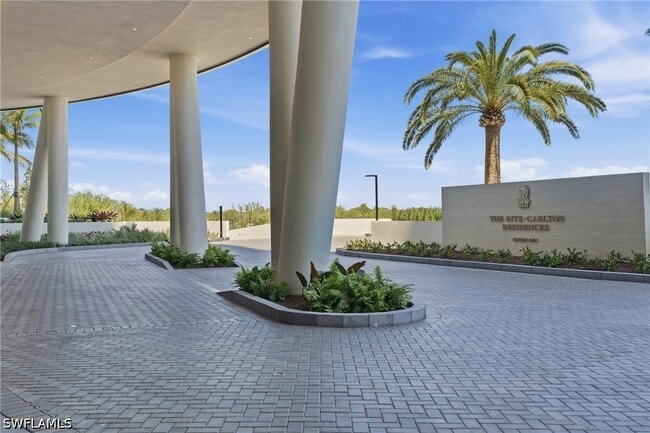 Building Photo - 5100 Seagrass Blvd Unit 201