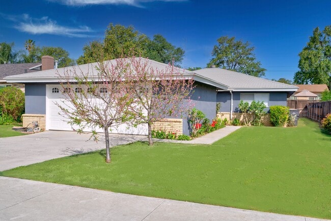 Building Photo - 8311 Raintree Ave