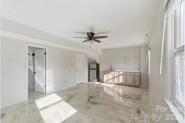 Photo - "Discover Comfort and Space in Charlotte: 4-Bed, 3-Bath Gem on Red Carriage Lane!"