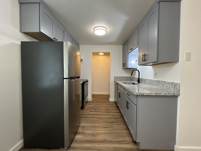Photo - Updated 1BD Apartment Near Downtown with Balcony & Modern Kitchen Updates off street parking Unit 7721