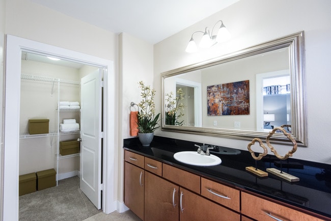 Upgraded baths with granite countertops and framed mirrors