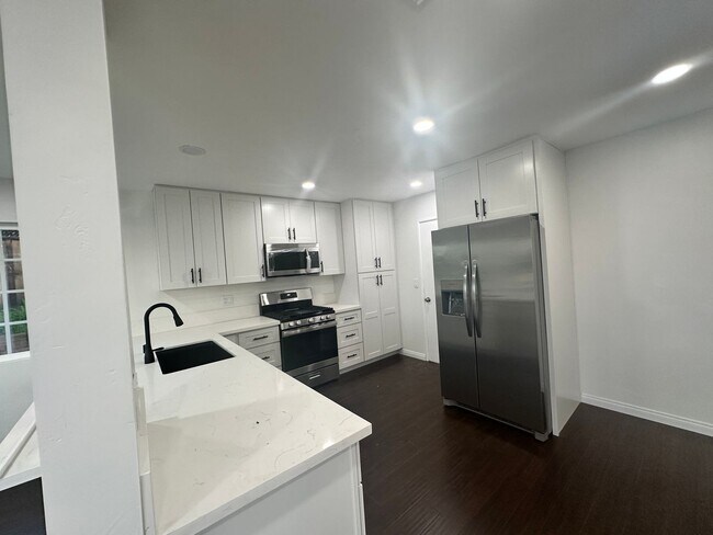 Photo - Beautifully Renovated 3-Bed, 2-Bath Home with Pool in Prime Location