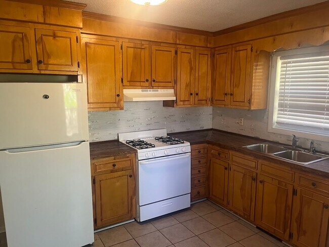 Photo - Available now. Freshly-painted 4 BR/1.5 BA Home on Big Lot in the Heart of James Island!