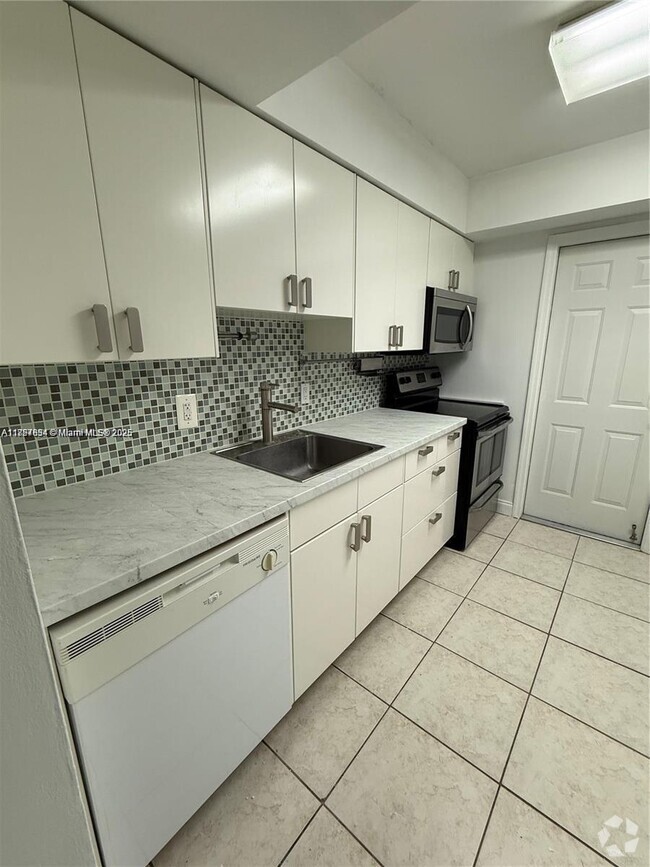Building Photo - 9971 W Bay Harbor Dr Unit 205 Rental