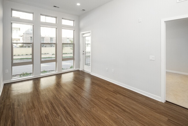 Floor-to-ceiling windows in living/dining areas (in select apartments)