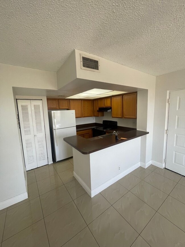 Photo - 708 Executive Center Dr Unit 32, FL 33401
