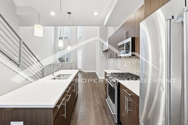 Photo - Stunning Townhome with Central AC and 2-Car Garage