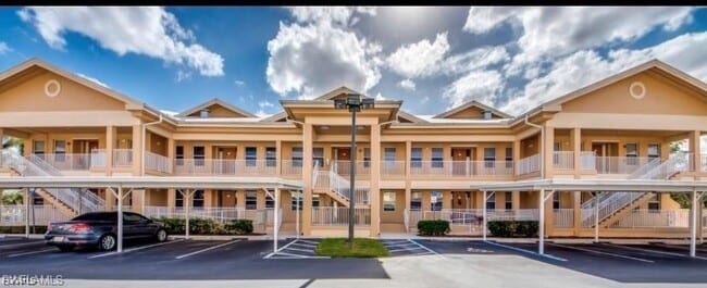 Building Photo - 15250 Riverbend Blvd Unit 204