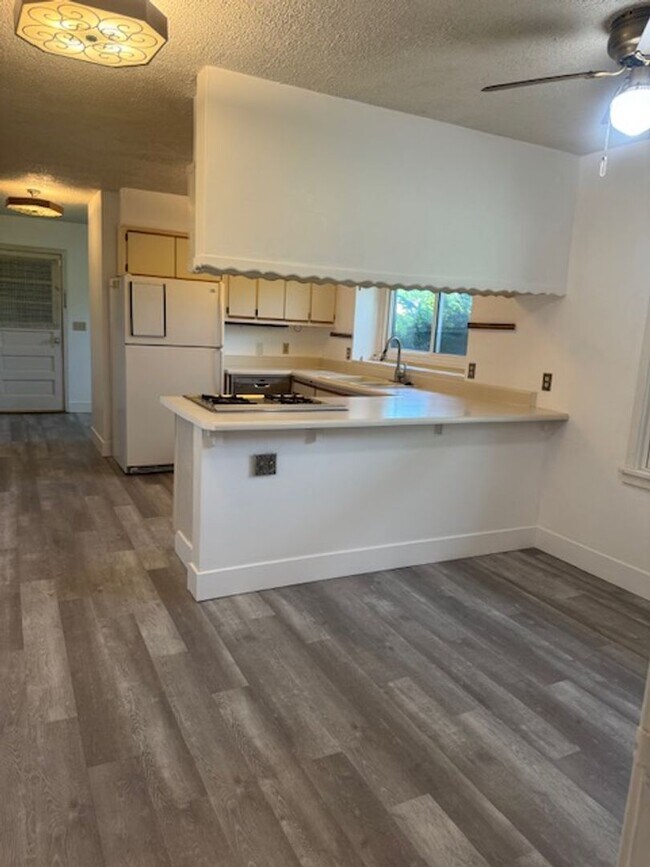 Photo - Spacious 3 Bedroom Home on Large Corner Lot with Sunporch!