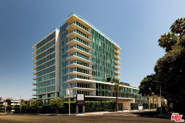 Building Photo - 9000 W 3rd St Unit 104