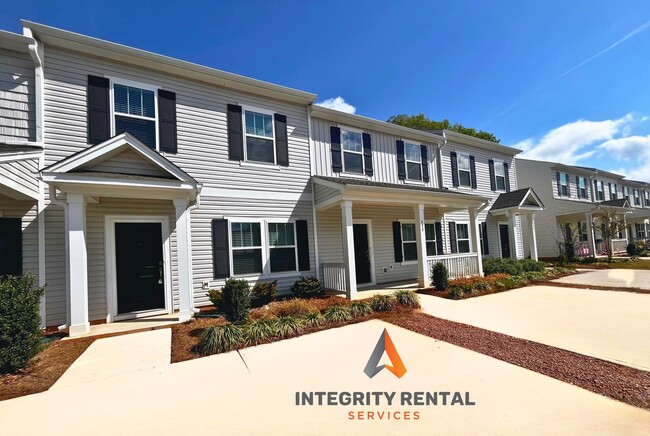 Building Photo - Charming 3-Bedroom End Unit Townhome Near Jack Alexander Blvd - APRIL MOVE IN SPECIAL