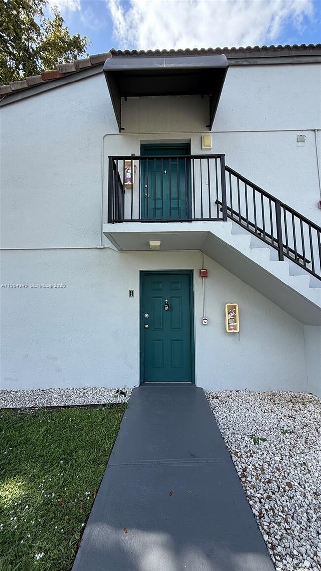 Building Photo - 7210 NW 179th St Unit 105