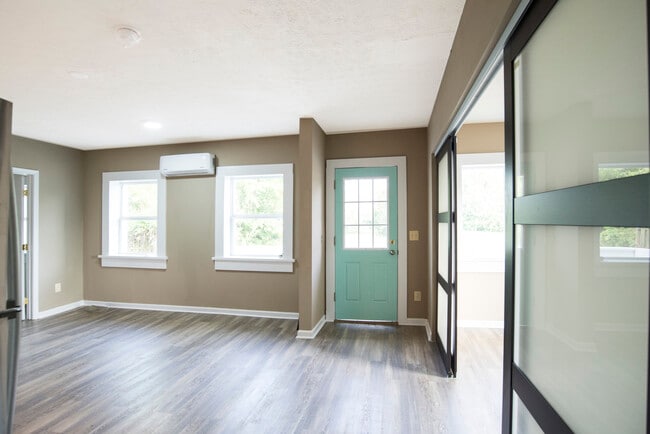 large windows, open floor plan. - 15010 Point Lookout Rd Unit 2