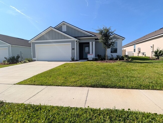 Building Photo - PREMIUM PRICE, PREMIUM FINISHES AND FULLY FENCED REAR YARD - THIS 3/2/2 IN THE DESIRABLE GATED DO...