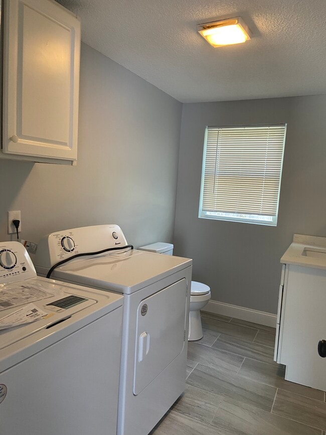 Half bath w/ washer dryer hook up - 33 Cecile St