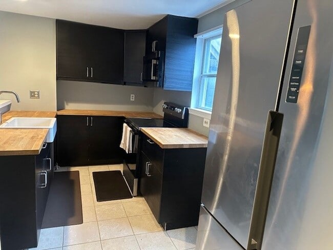 Photo - One level living in a spacious upgraded condo