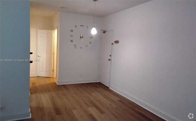 Building Photo - 7334 Harding Ave Unit 16 Rental