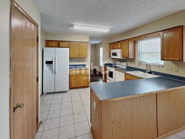 Photo - 7908 Windrift Pl