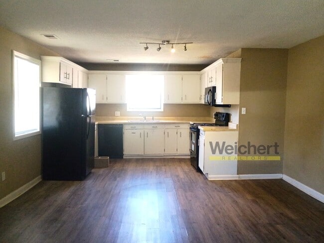 Photo - Spacious 4BR Home – Walk-In Closet & W/D Hookups