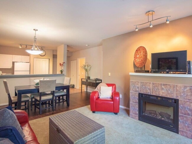 Open Living With Fireplace at Metropolitan Collection Apartments