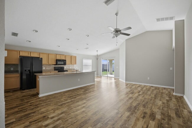 Photo - 4BR Gated Community Home with Fenced Yard, 2-Car Garage & Open Floor Plan