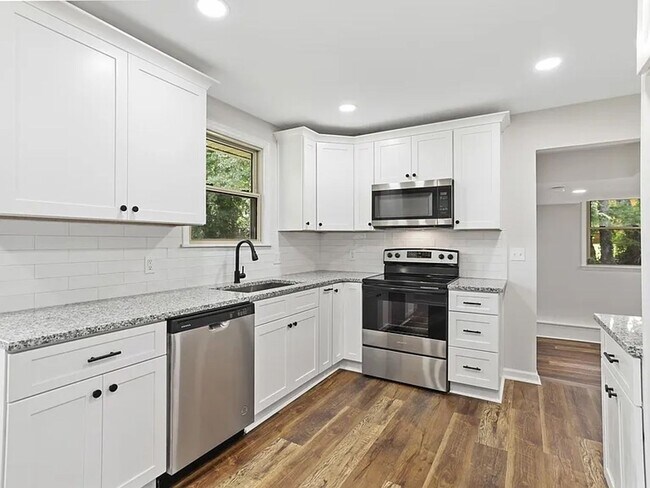 Photo - Welcome home to space, comfort, and thoughtful updates in this beautifully maintained 5-bedroom, ...